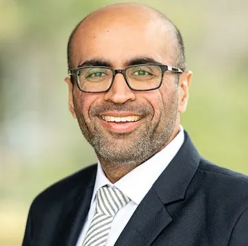 Akhtar Samani, Agent in  - Compass