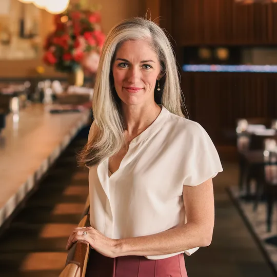 Kelly Lombardi, Agent in  - Compass