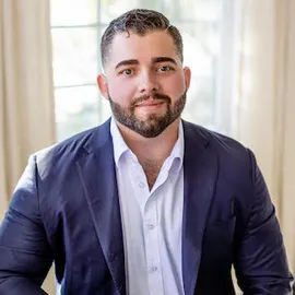 Alex Mainini, Agent in  - Compass