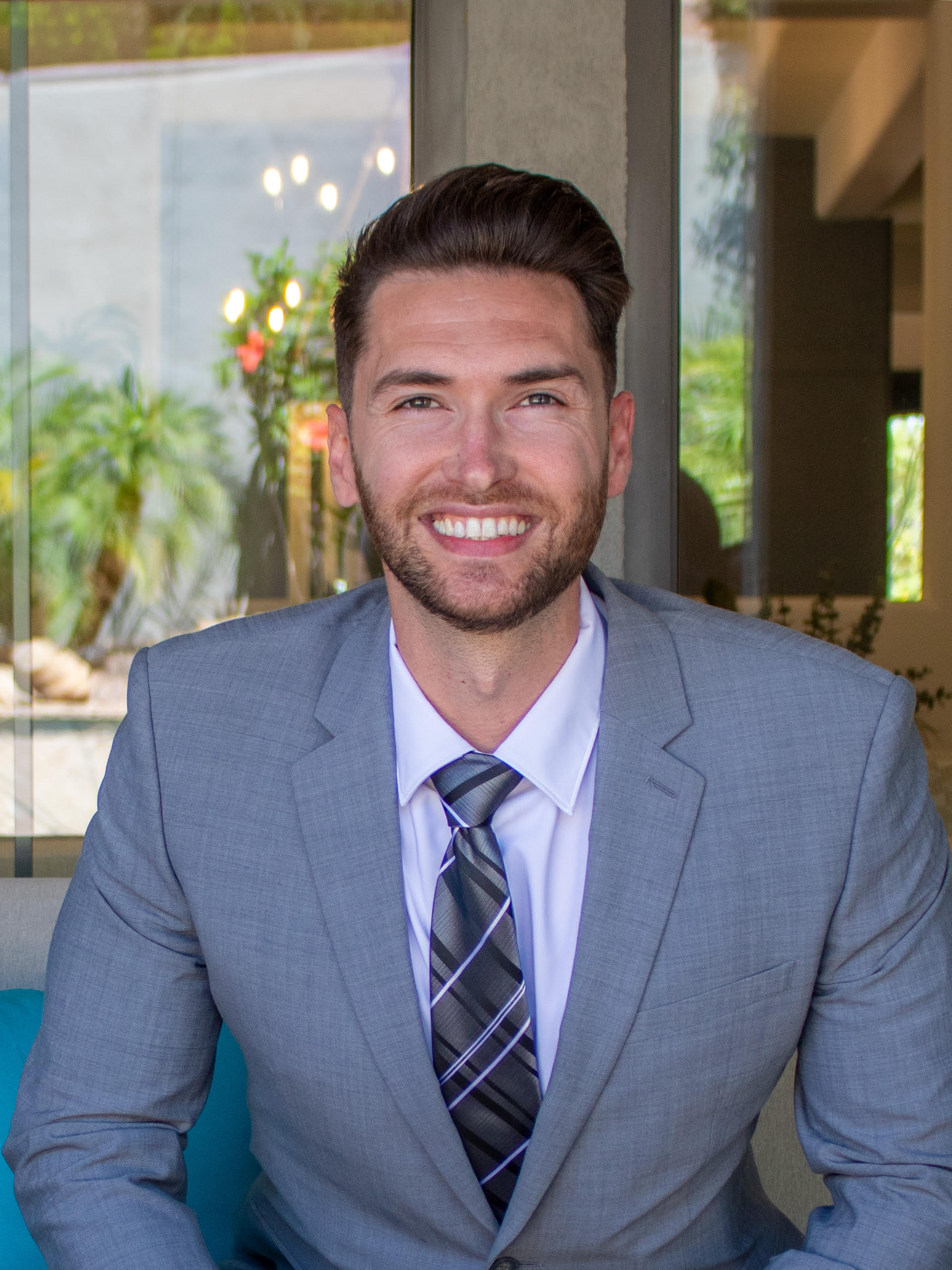 Headshot of Adam Iqab