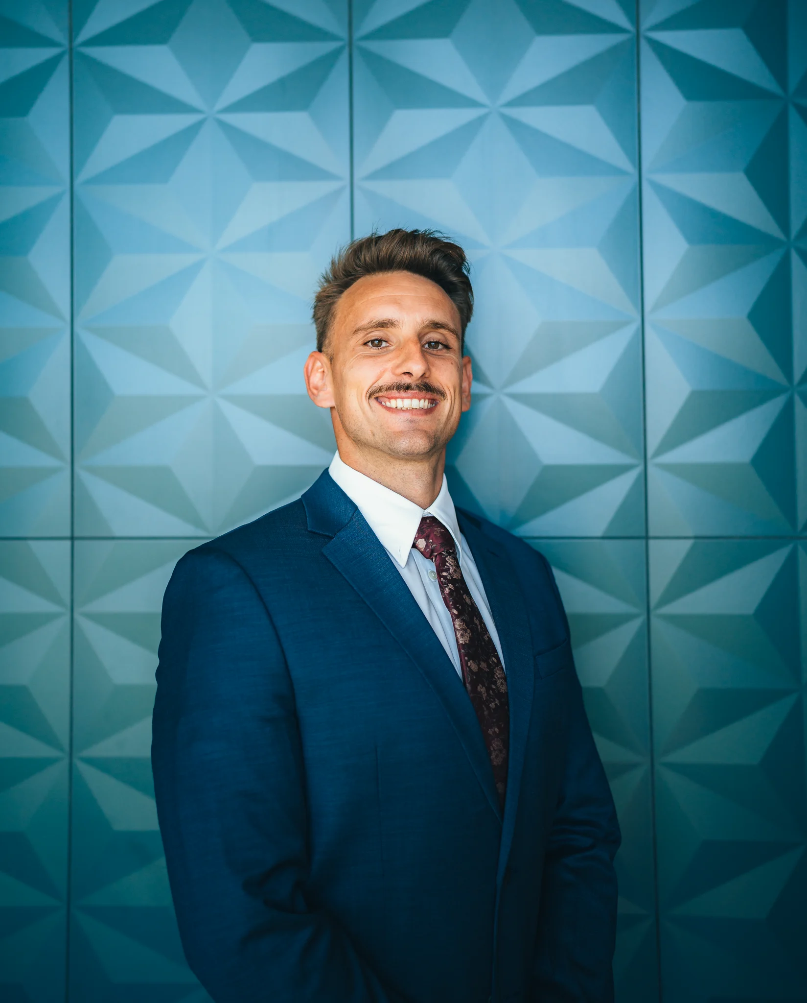 Headshot of Travis Raciti