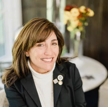 Melanie Rosenbaum, Agent in  - Compass