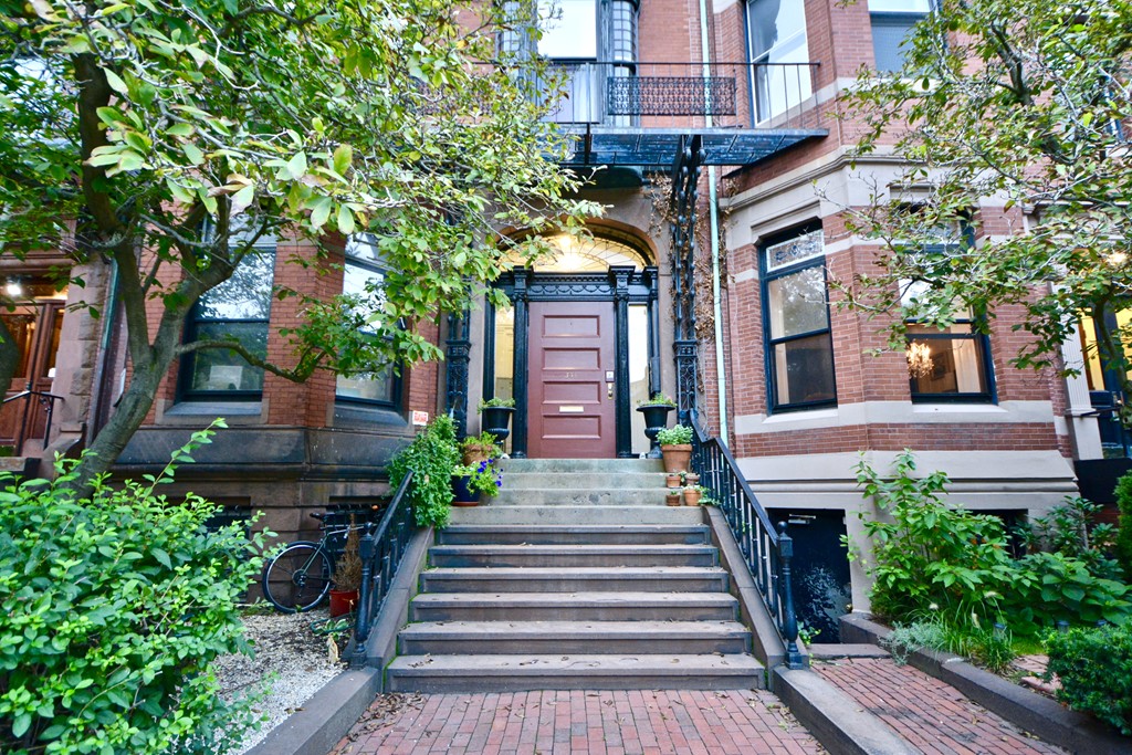 brick building with brown door