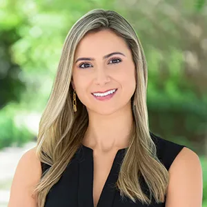 Karina Reyes, Agent in  - Compass