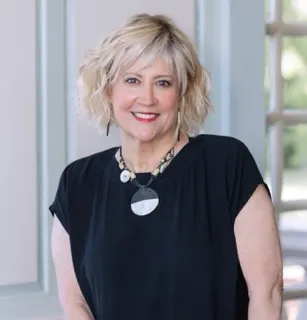 Terri Brennan, Agent in  - Compass