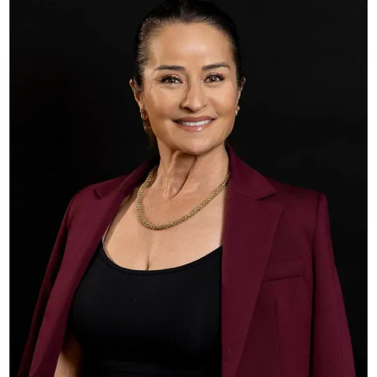 Lila Kazemi, Agent in  - Compass