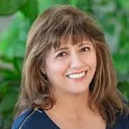 Carmela Venezio, Agent in  - Compass