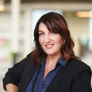 Radha Tomassetti, Agent in  - Compass