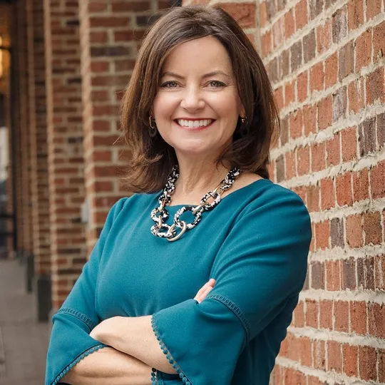 Marnie Schaar, Agent in  - Compass