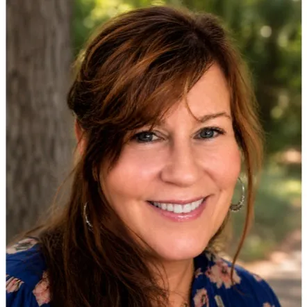 Laurie Clarke, Agent in  - Compass