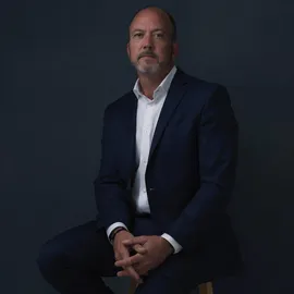 Sean McKenna, Agent in  - Compass