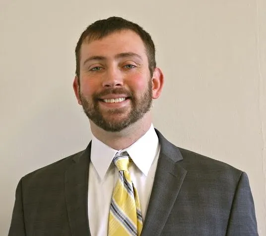 Sean McConarty, Agent in  - Compass