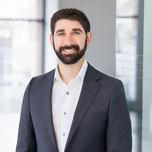 Adam Freidfertig, Agent in  - Compass