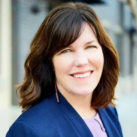 Christine Kennedy, Agent in  - Compass