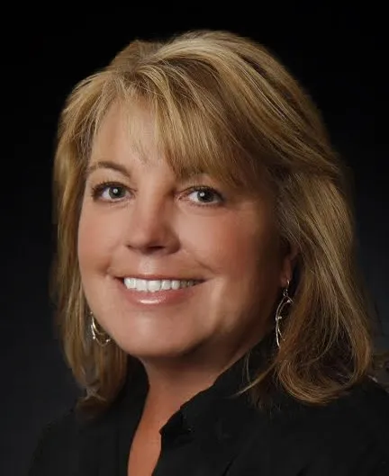 Christine Miller, Agent in  - Compass