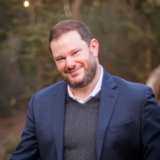 Headshot of Joshua Scherling