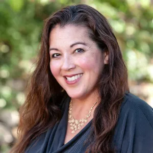 Andrea Gibson, Agent in  - Compass