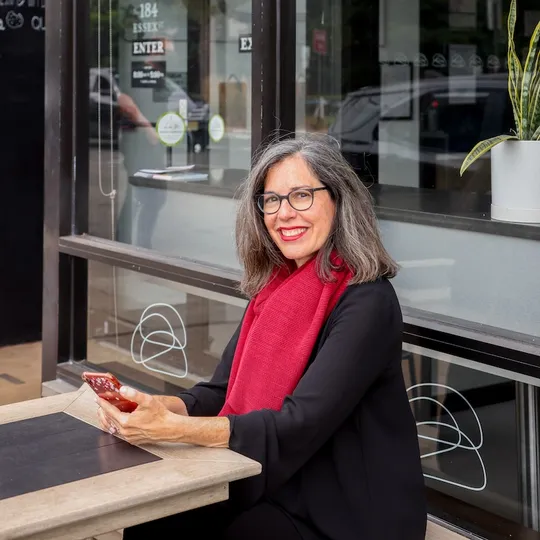 Lori Altman-Achitoov, Agent in  - Compass