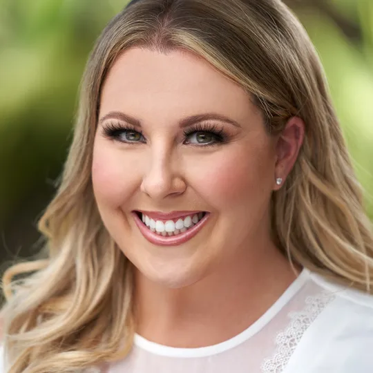 Brittney McStravog, Agent in  - Compass