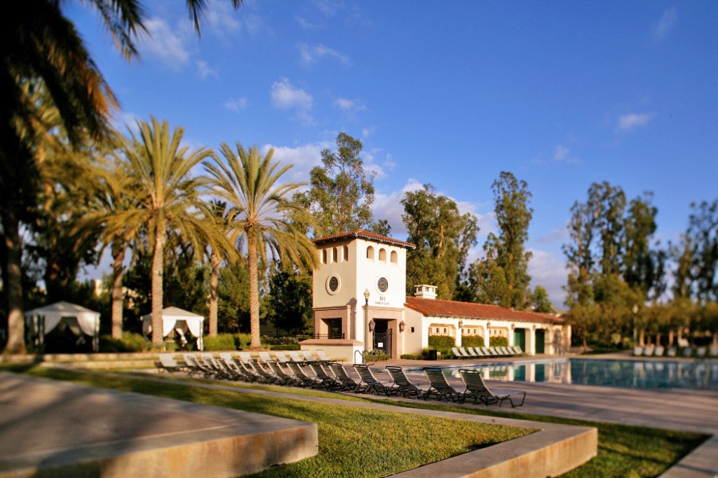 44 Modesto Irvine, CA 92602 - Photo 23 of 49 a view of swimming pool with outdoor seating and house in the background