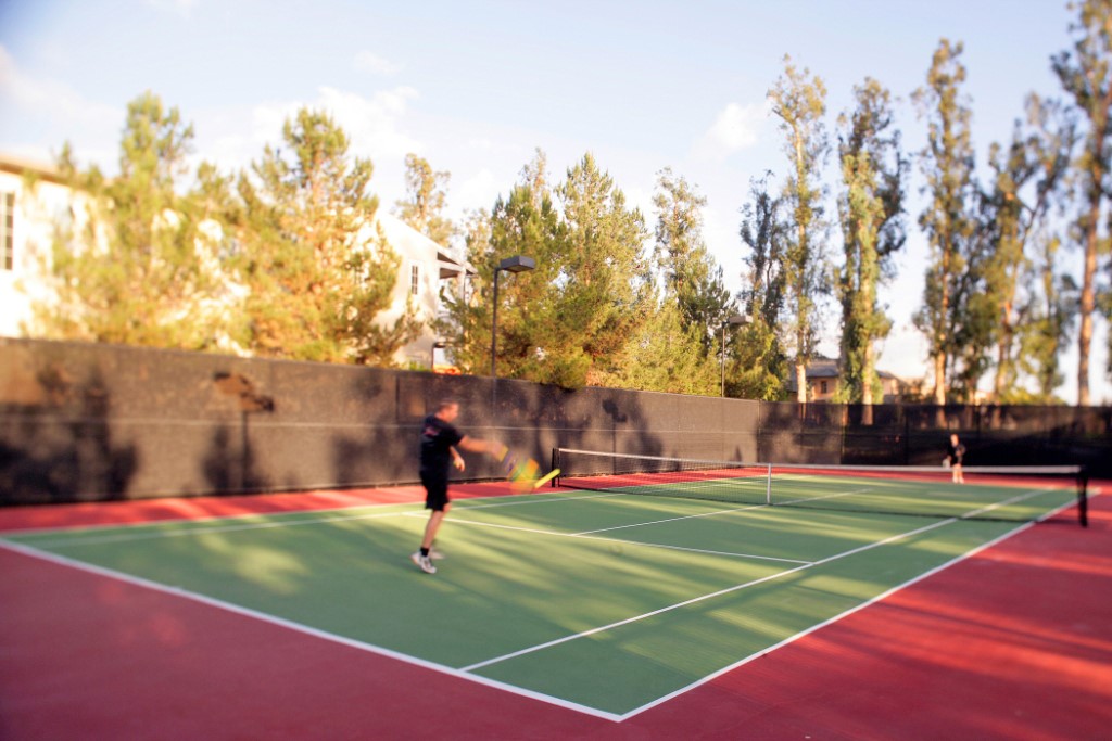 44 Modesto Irvine, CA 92602 - Photo 24 of 49 a tennis ground with trees in the background