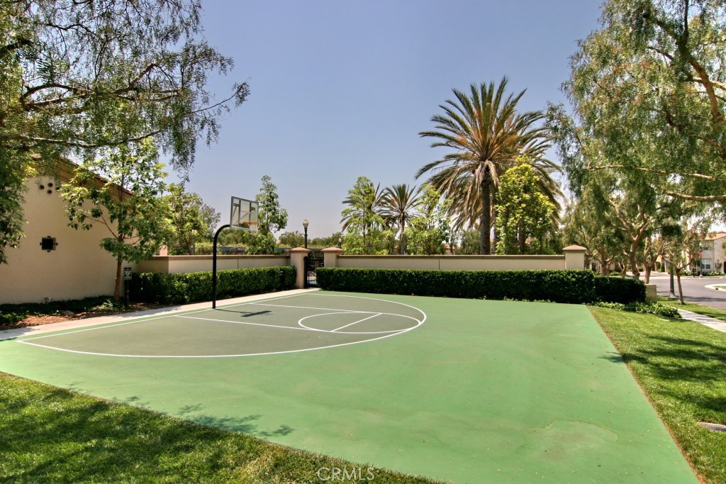 44 Modesto Irvine, CA 92602 - Photo 28 of 49 a swimming pool with an outdoor space and seating area