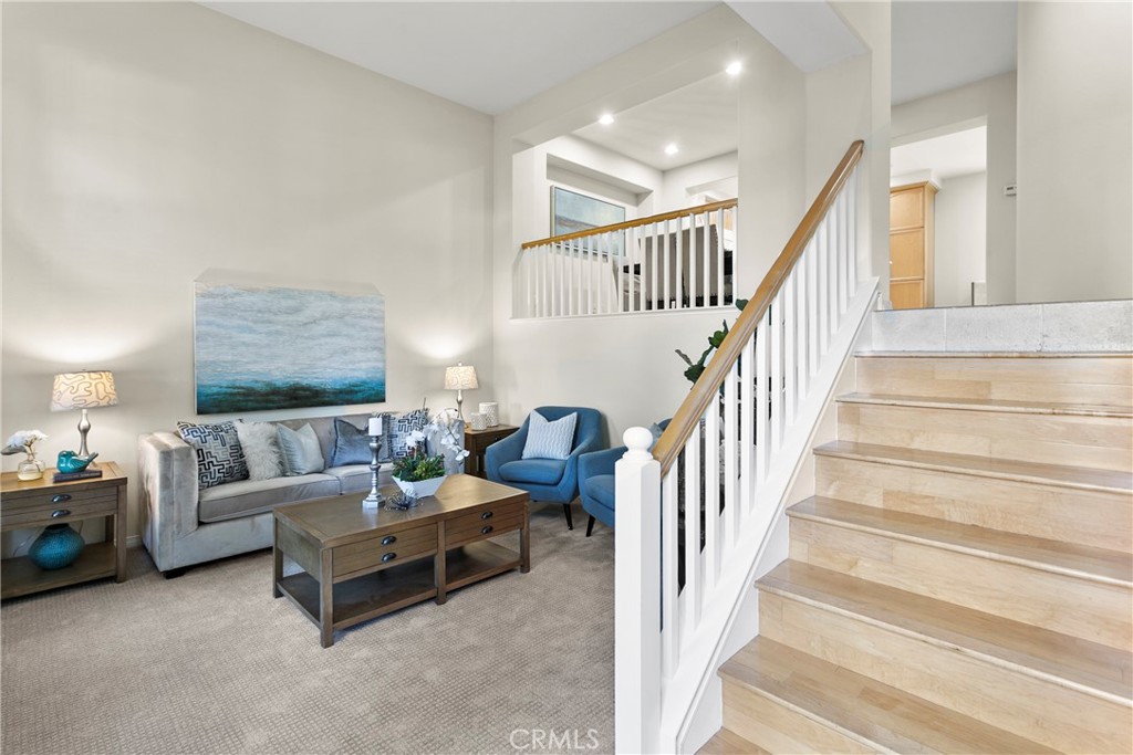 44 Modesto Irvine, CA 92602 - Photo 3 of 49 a living room with furniture and stairs