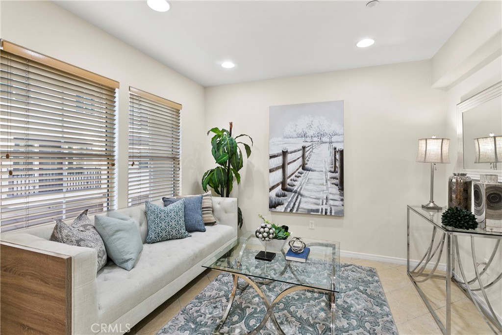 44 Modesto Irvine, CA 92602 - Photo 7 of 49 a living room with furniture and floor to ceiling windows
