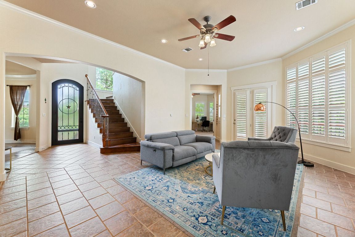 2800 Waymaker Way, Unit 63 Austin, TX 78746 - Photo 10 of 36 a living room with furniture and wooden floor