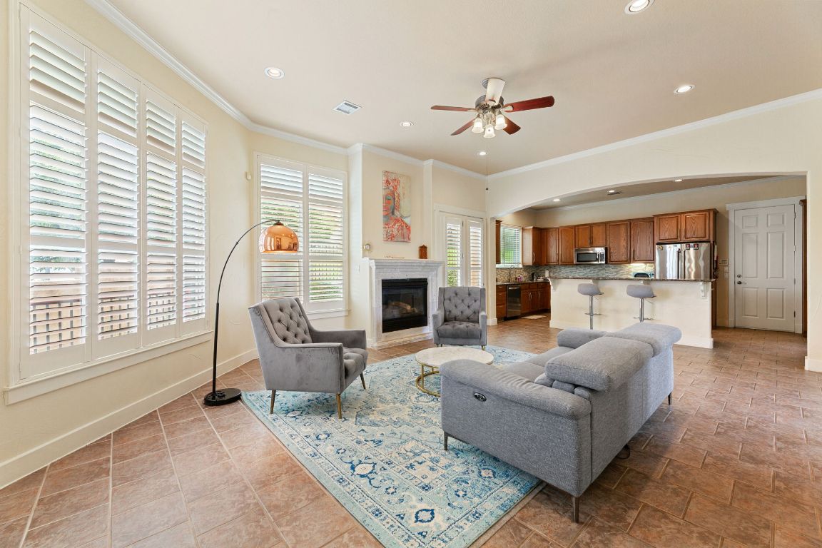 2800 Waymaker Way, Unit 63 Austin, TX 78746 - Photo 12 of 36 a living room with furniture and a large window