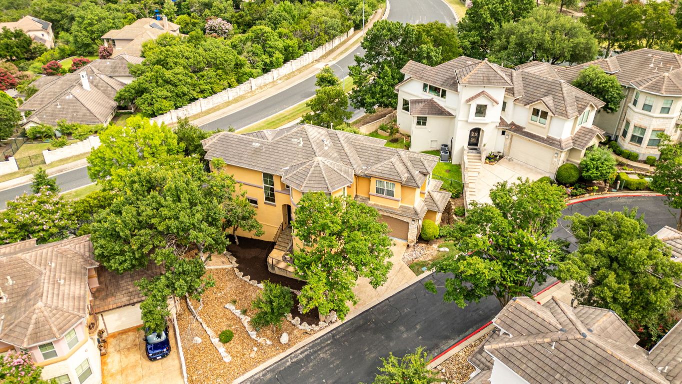 2800 Waymaker Way, Unit 63 Austin, TX 78746 - Photo 30 of 36 a view of building with yard