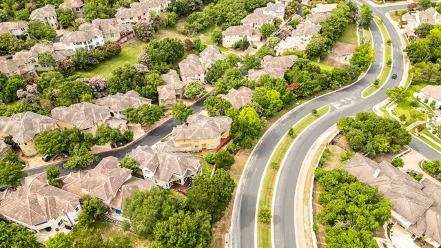a view of a swimming pool with a garden