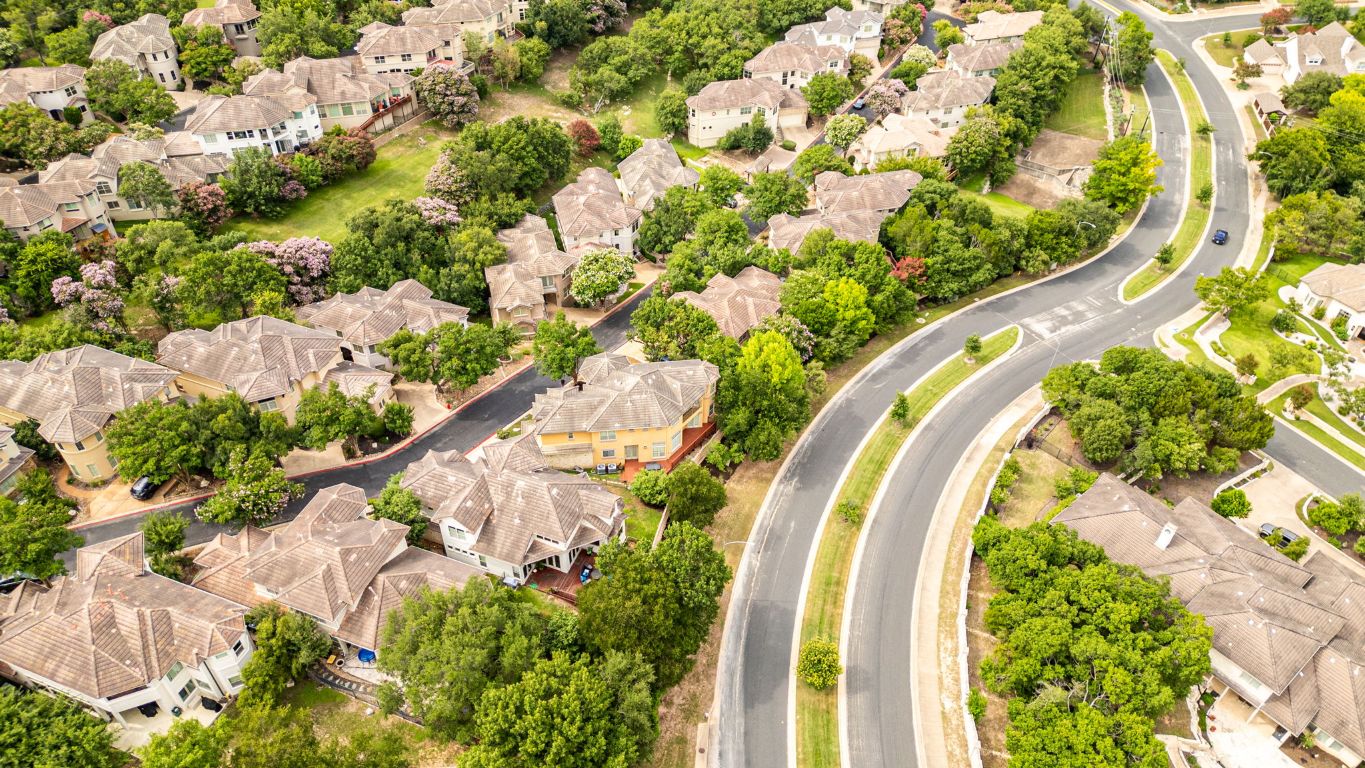 2800 Waymaker Way, Unit 63 Austin, TX 78746 - Photo 31 of 36 a view of a swimming pool with a garden