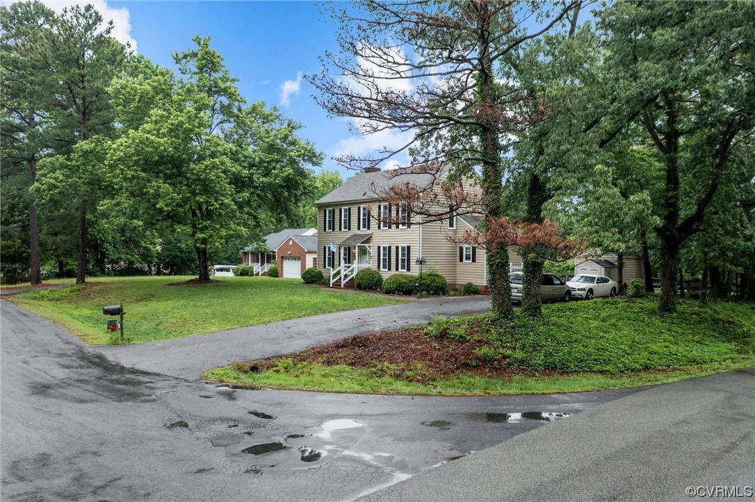 4500 Riderwood Way Chester, VA 23831 - Photo 41 of 48 a front view of a house with a yard