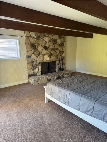 a living room with a couch and a table