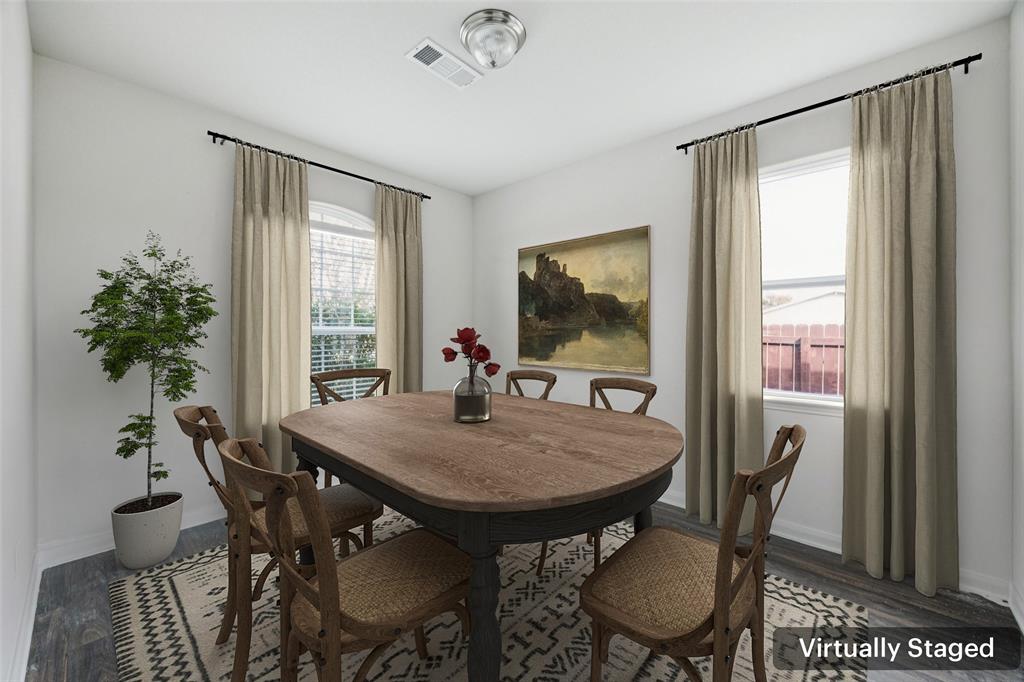 1020 Walnut Ridge Drive Hutchins, TX 75141 - Photo 11 of 28 a view of a dining room with furniture window and wooden floor