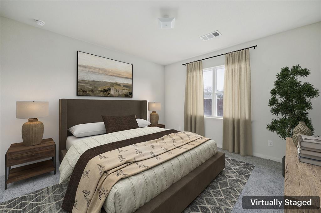 1020 Walnut Ridge Drive Hutchins, TX 75141 - Photo 14 of 28 a bedroom with a bed and a couch