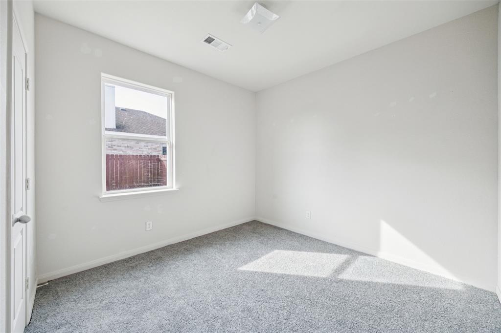 1020 Walnut Ridge Drive Hutchins, TX 75141 - Photo 19 of 28 an empty room with a window