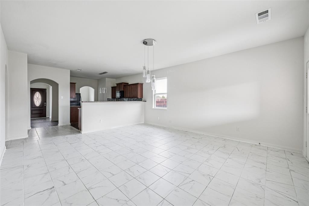 1020 Walnut Ridge Drive Hutchins, TX 75141 - Photo 4 of 28 a view of a kitchen with furniture and window