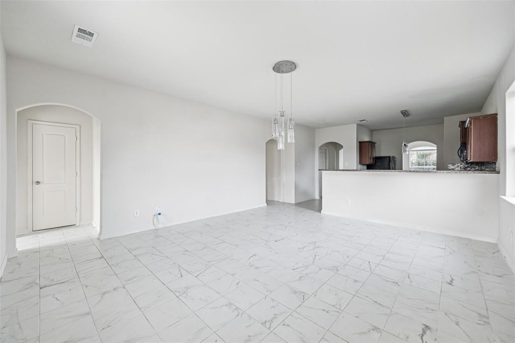 1020 Walnut Ridge Drive Hutchins, TX 75141 - Photo 6 of 28 a view of a kitchen with furniture and a sink
