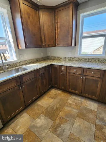 a kitchen with a sink and a cabinets