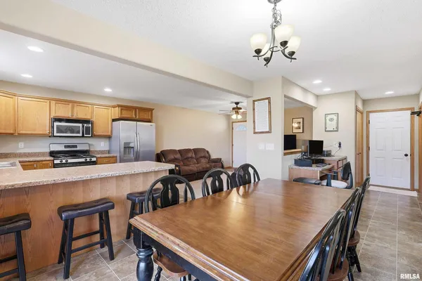 a view of a dining room with furniture