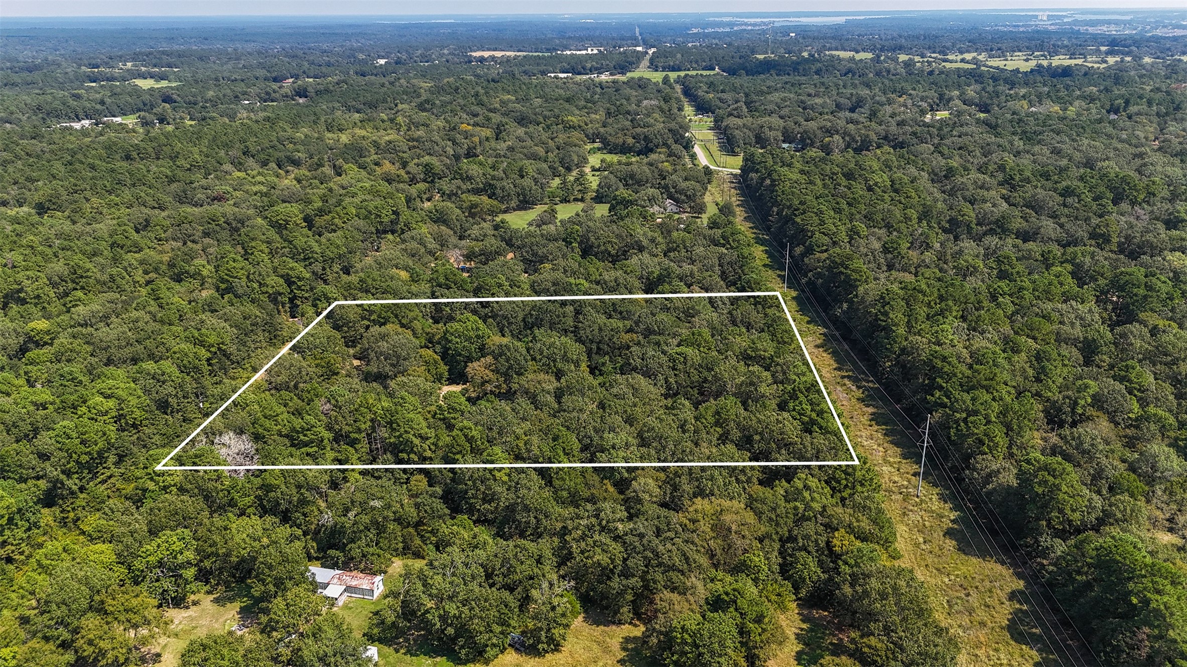 23161 Henson Road Montgomery, TX 77356 - Photo 5 of 10 an aerial view of houses with trees