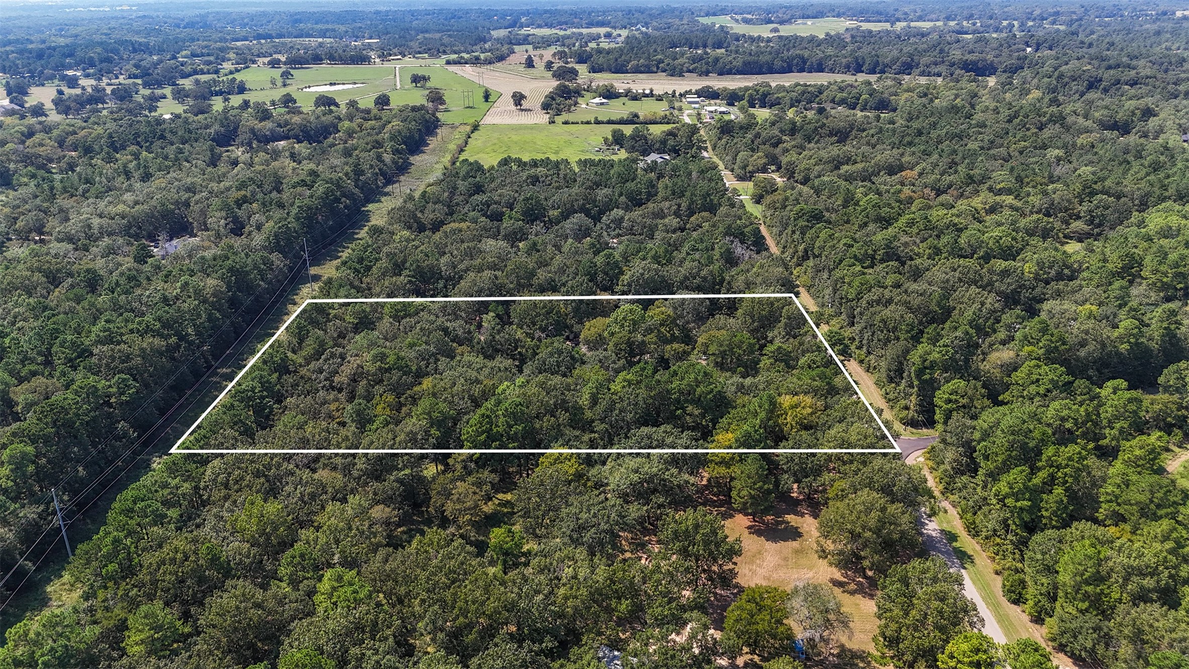 23161 Henson Road Montgomery, TX 77356 - Photo 9 of 10 an aerial view of house with a yard