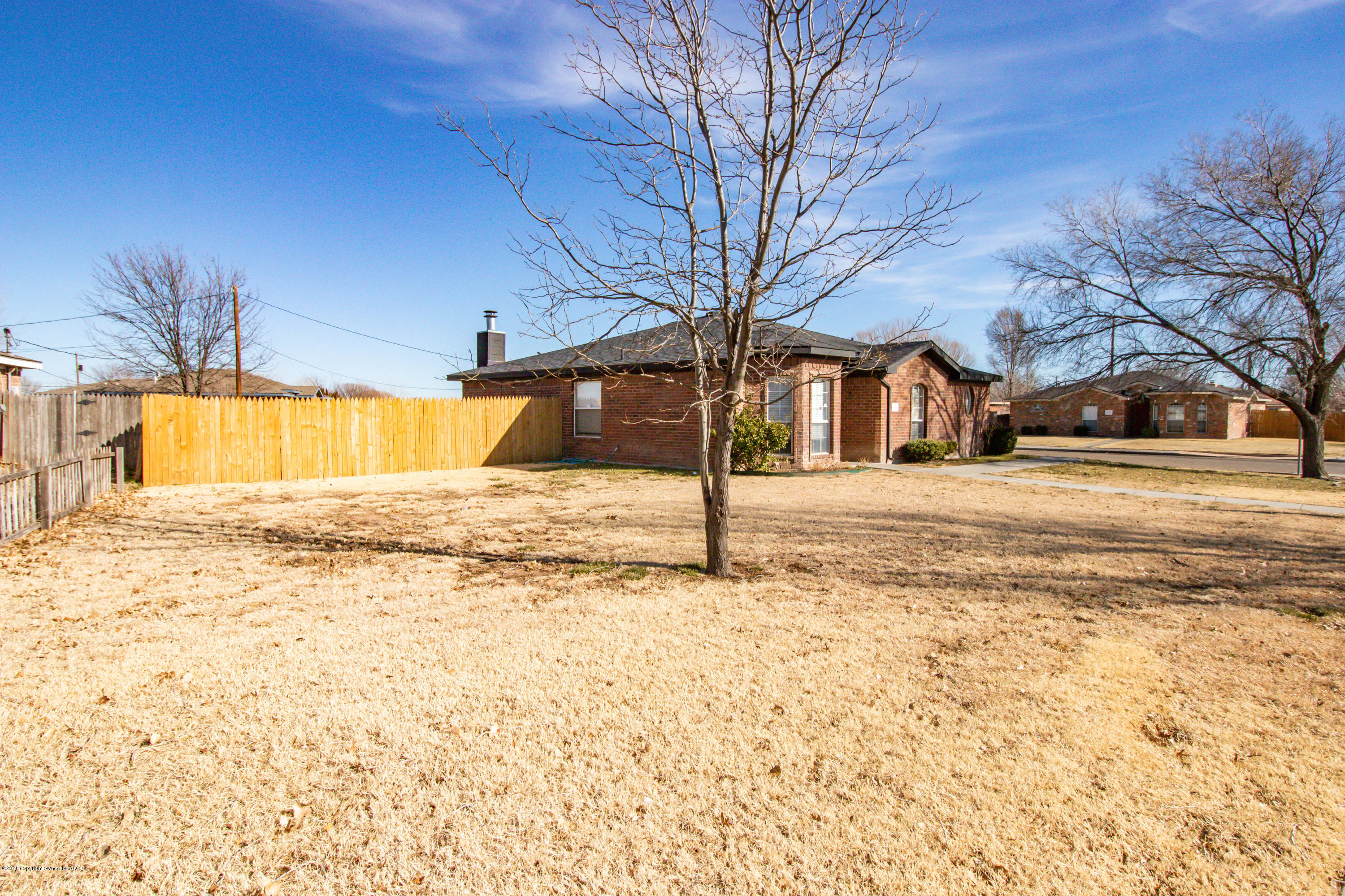 5203 Capulin Lane Amarillo, TX 79110 - Photo 3 of 29 a view of a yard with a house