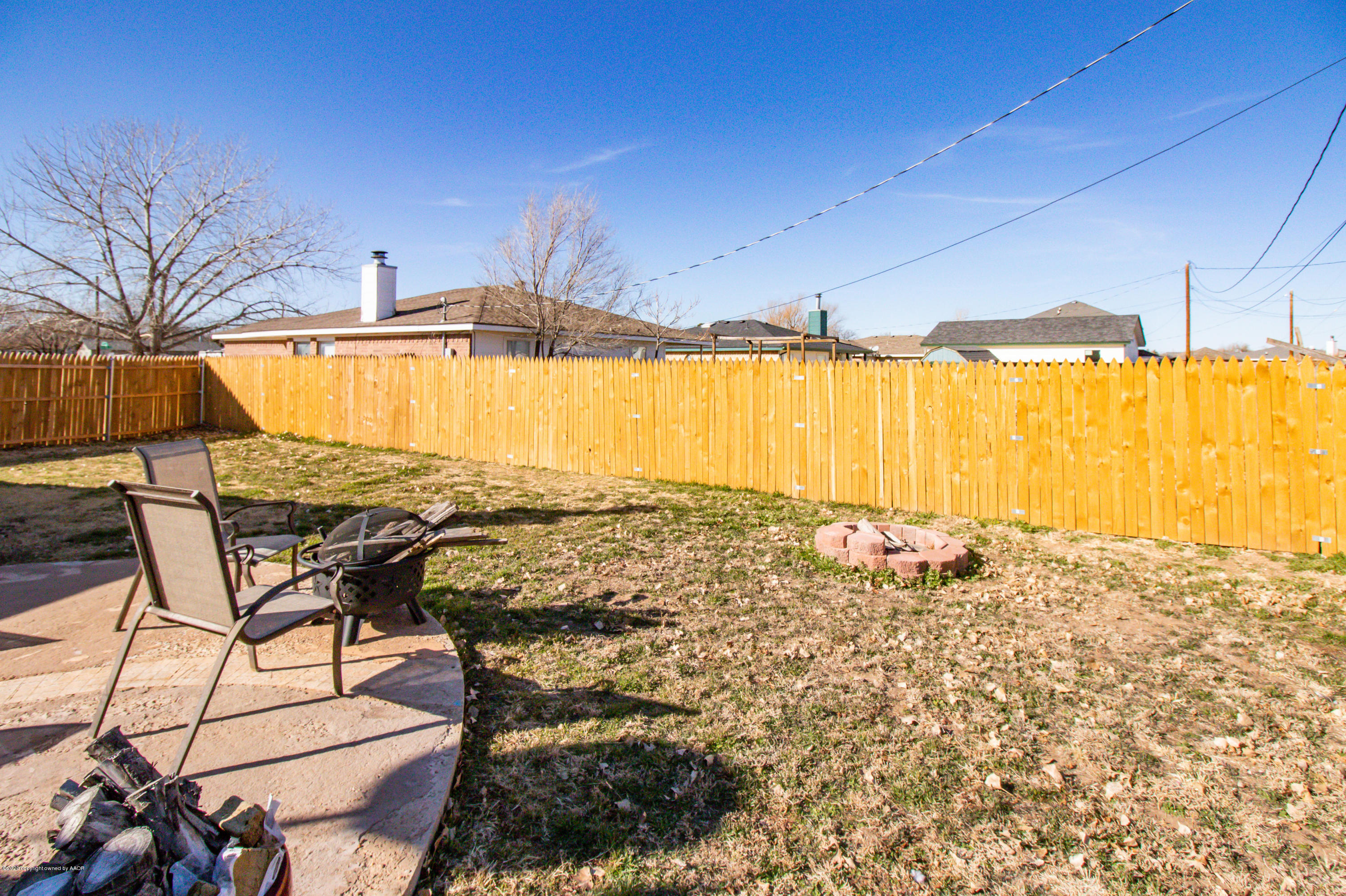 5203 Capulin Lane Amarillo, TX 79110 - Photo 29 of 29 a view of a swimming pool and a chair