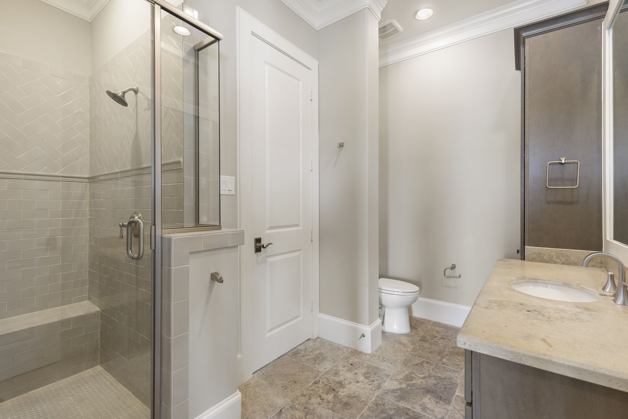 6806 West Warwick Lake Lane Spring, TX 77389 - Photo 27 of 50 a bathroom with a sink a toilet and shower