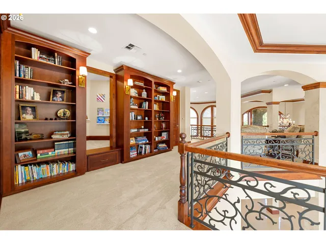 a view of a living room and workspace