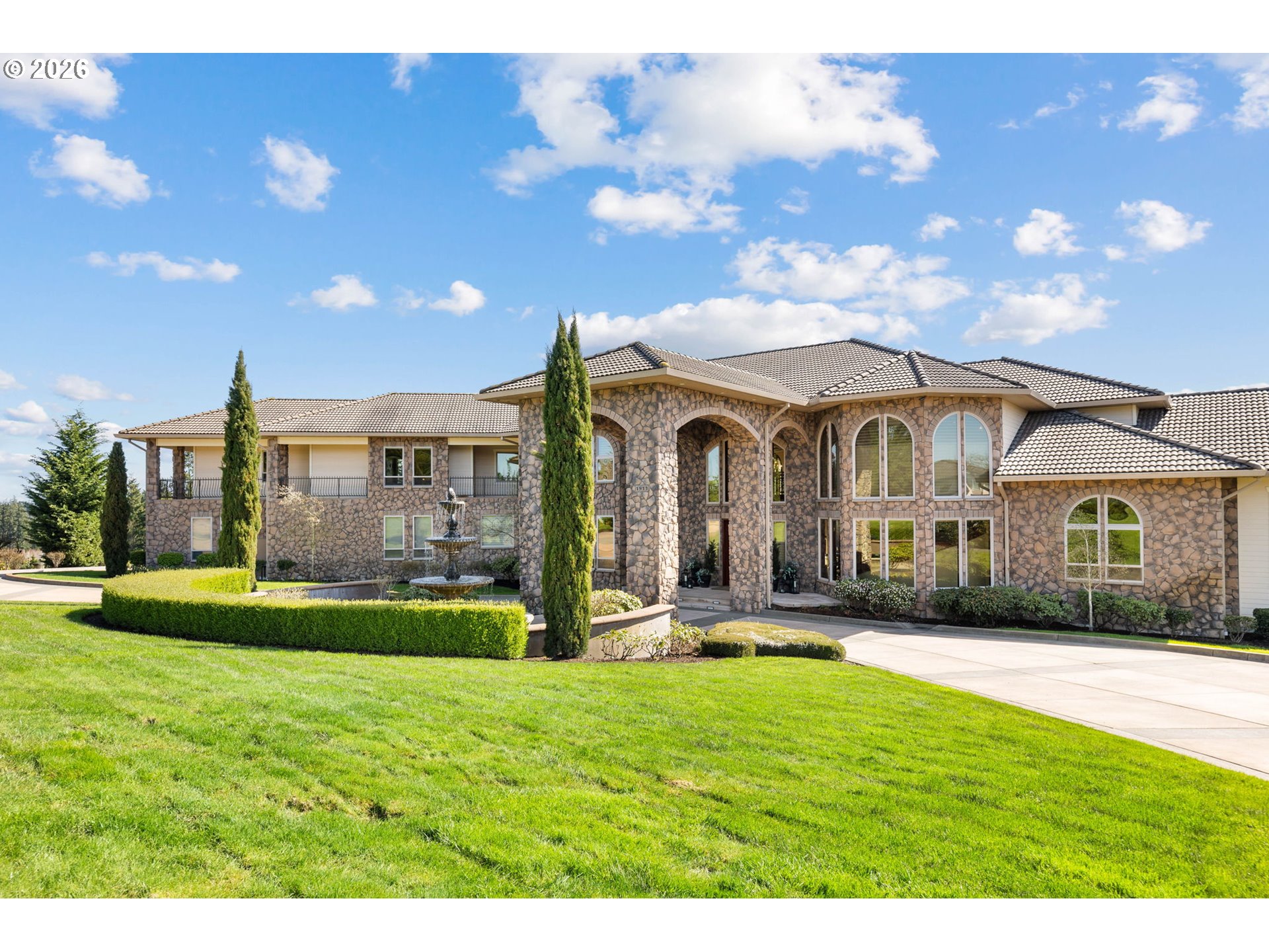 1911 Northwest 206th Street Ridgefield, WA 98642 - Photo 2 of 31 a front view of a house with a yard