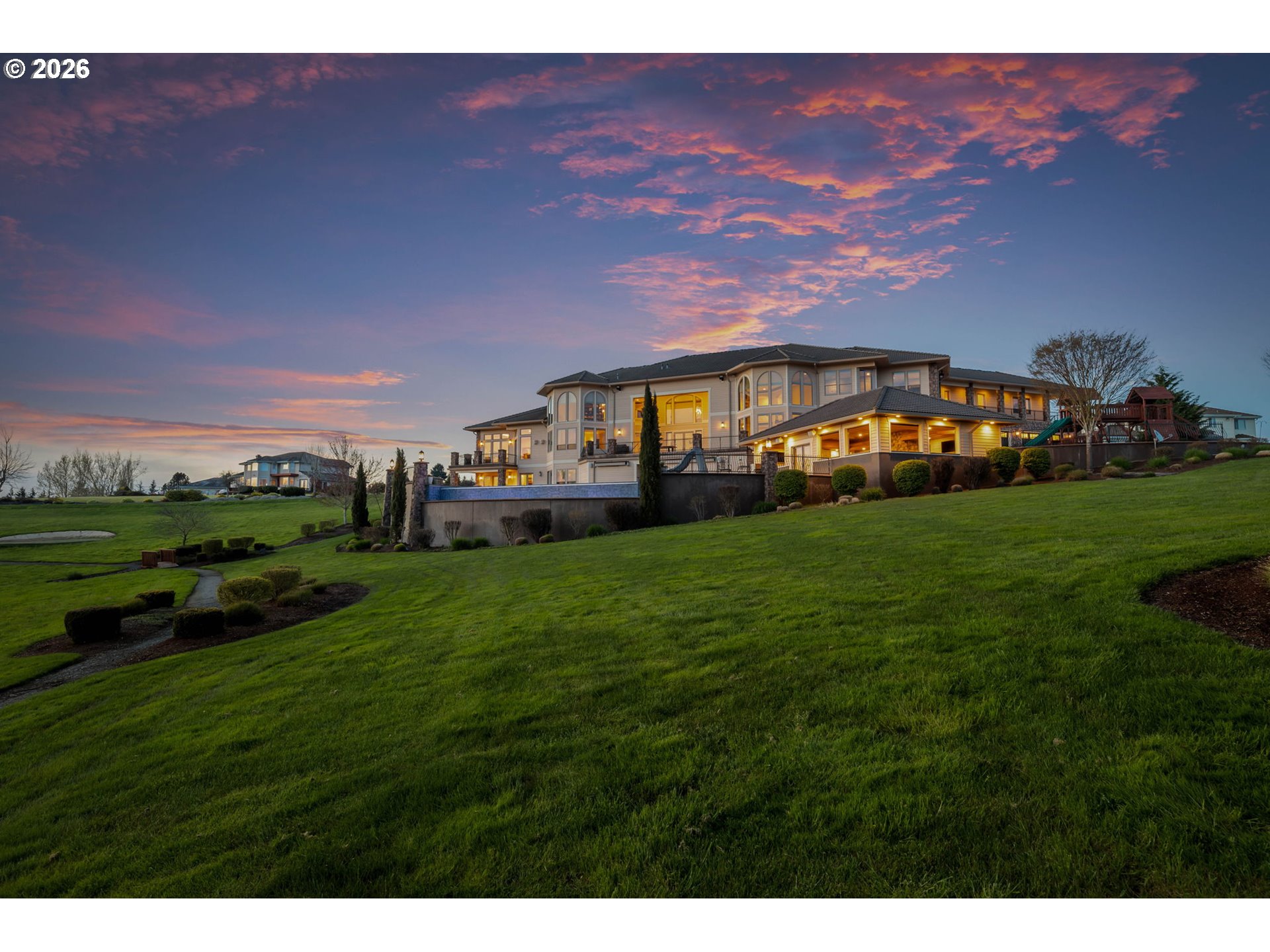 1911 Northwest 206th Street Ridgefield, WA 98642 - Photo 29 of 31 a view of a big house with a big yard